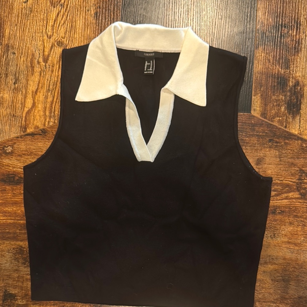 Black and White Sleeveless Polo Top